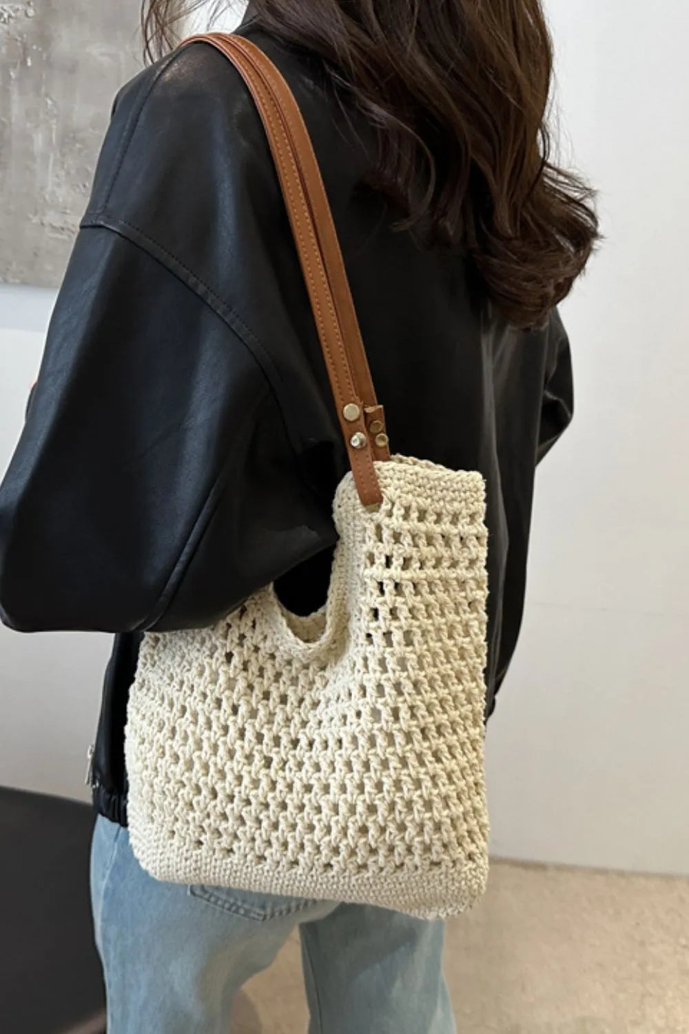 Women's woven cotton shoulder bag, stylish and lightweight for everyday use.