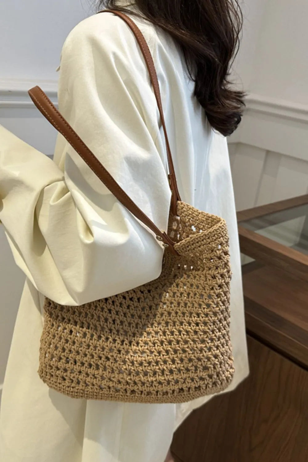 Lightweight woven cotton shoulder bag, an eco-friendly accessory for women.