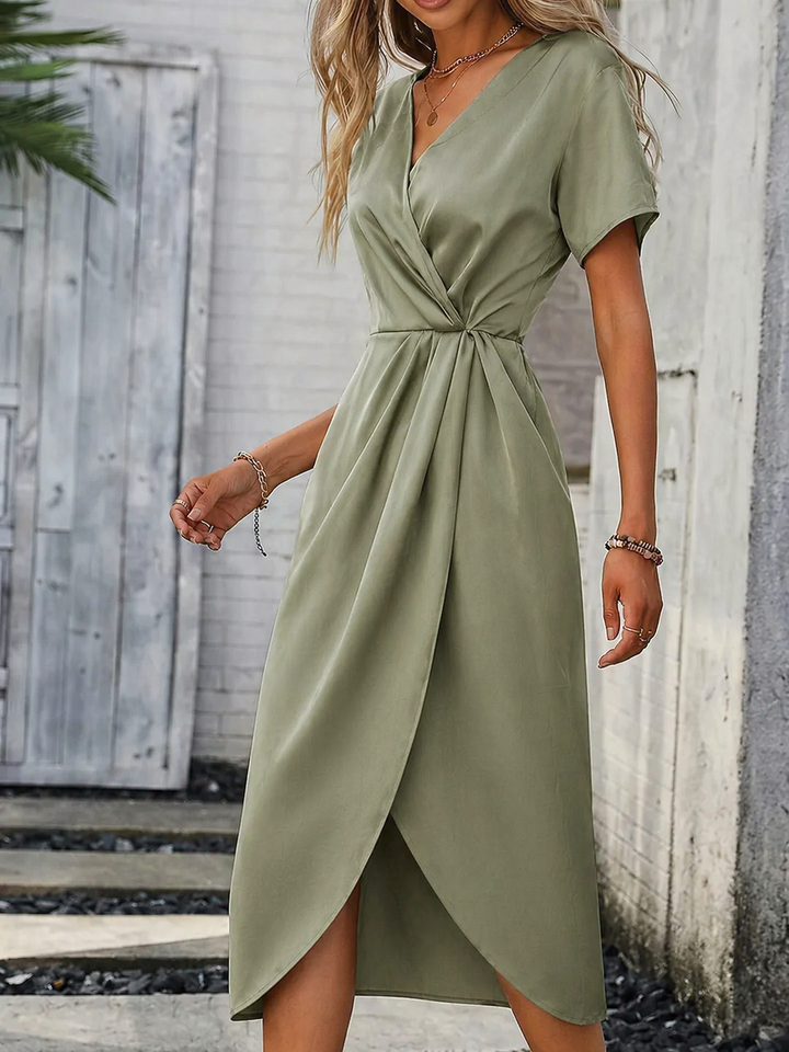 Chic women's summer wrap midi dress with short sleeves, a perfect flowy addition to any wardrobe.