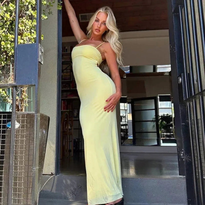 Sunny yellow backless bodycon maxi dress, women's summer party attire, ideal for elegant evening events.