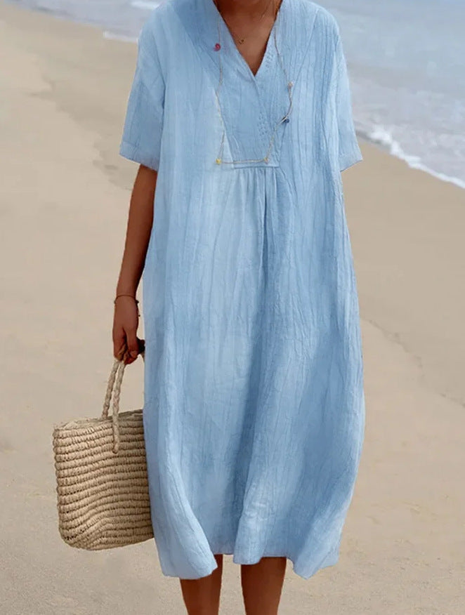 Elegant women's V-neck A-line midi dress with short sleeves, perfect for versatile summer style & comfort.