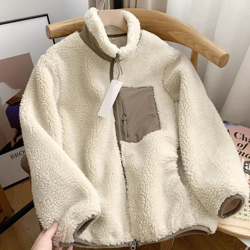 Soft, comfortable women's cozy jacket. Zip-up style provides warmth & everyday casual elegance.