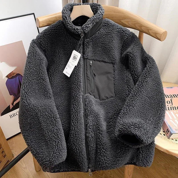 Practical women's outerwear: a cozy zip-up jacket for casual comfort in fall & winter weather.