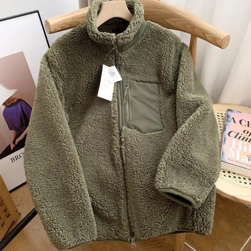 Stylish women's zip-up jacket with ribbed cuffs. Keeps you cozy & warm for everyday casual fashion.