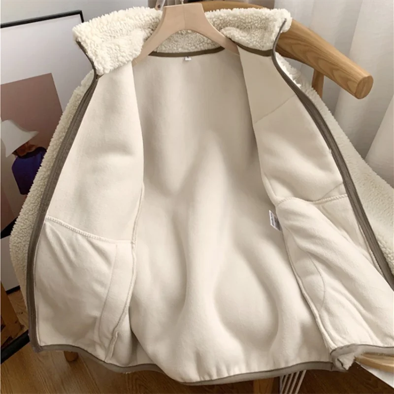 Full-length view of a comfortable women's cozy zip-up jacket. Essential casual outerwear for colder days.