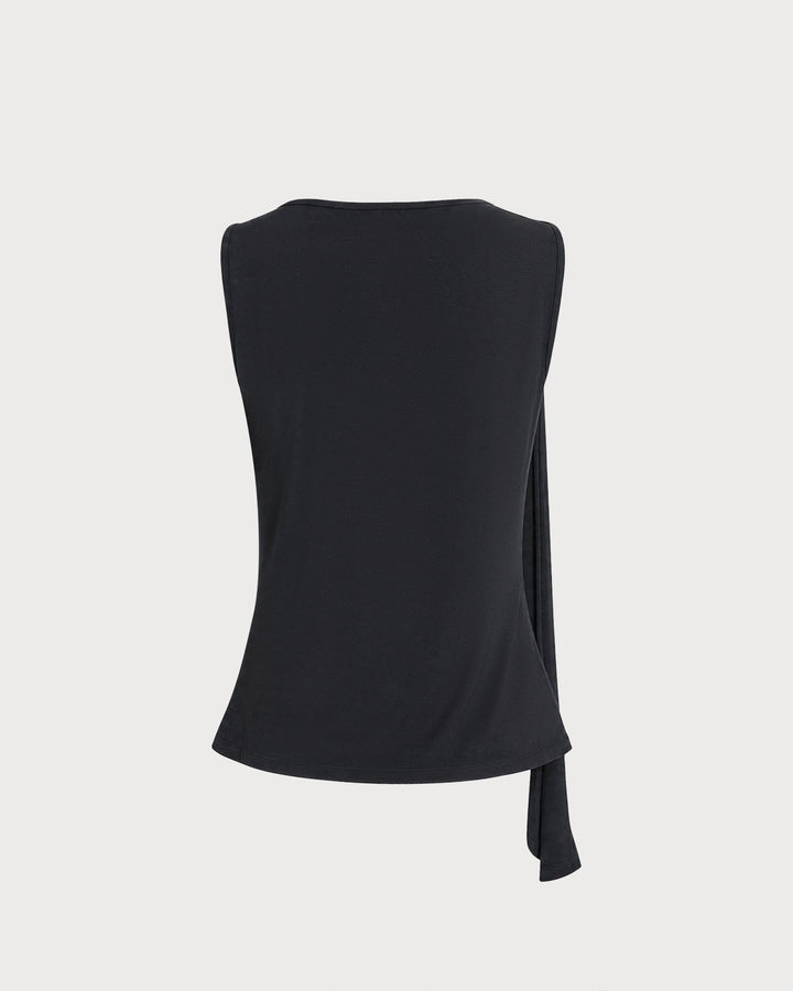 Sleeveless boat-neck wrap tank top for women. Elegant slim-fit design with chic button detail. Perfect summer style.