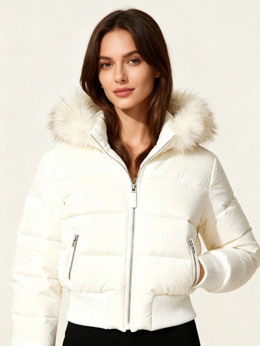 Chic women's puffer jacket, slim fit, with a cozy faux fur hooded design.