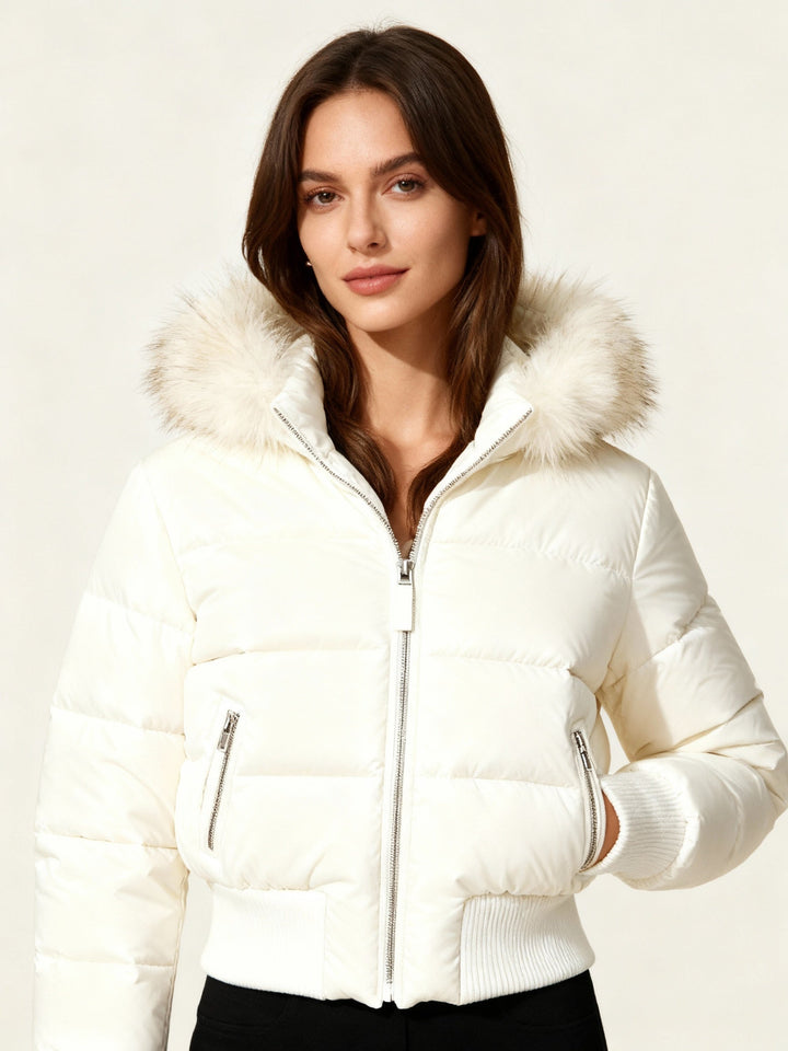 Chic women's puffer jacket, slim fit, with a cozy faux fur hooded design.