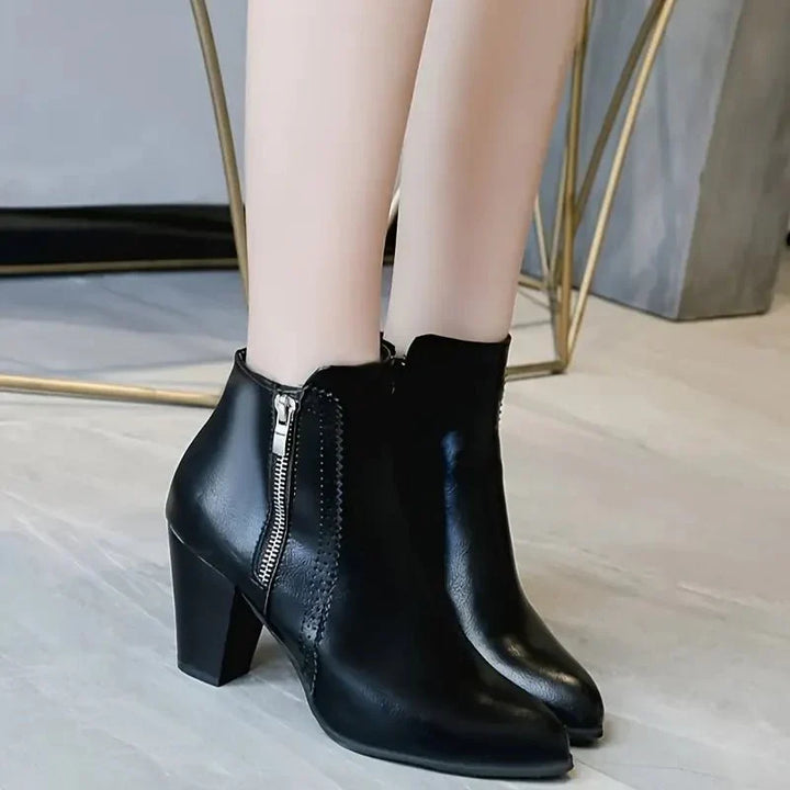 Women's versatile ankle boots, combining comfort & style: block heel, convenient side zip & delicate scalloped trim.