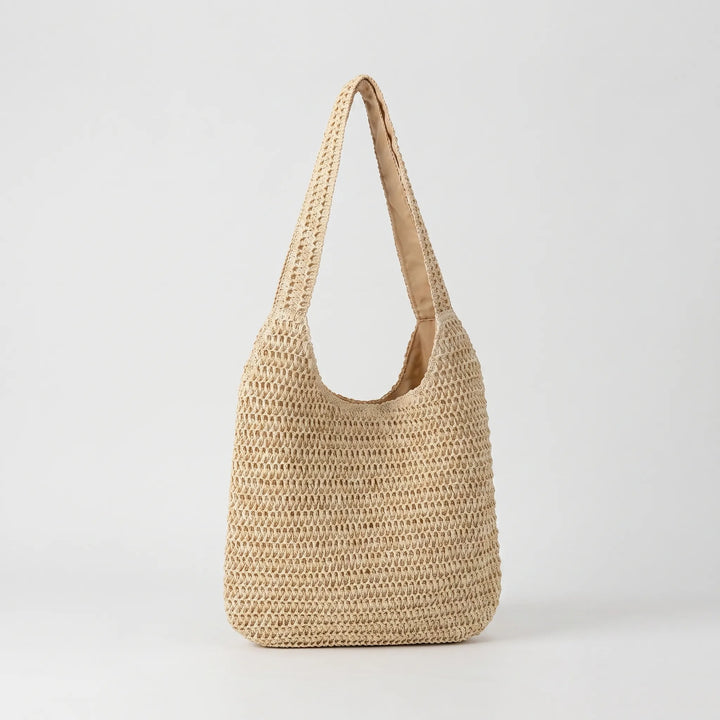 Handmade crochet oversized shoulder bag for women, a stylish beach tote for sunny days.