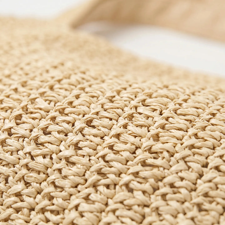Chic women's oversized crochet tote bag, ideal beach bag & vacation accessory for sunny getaways.