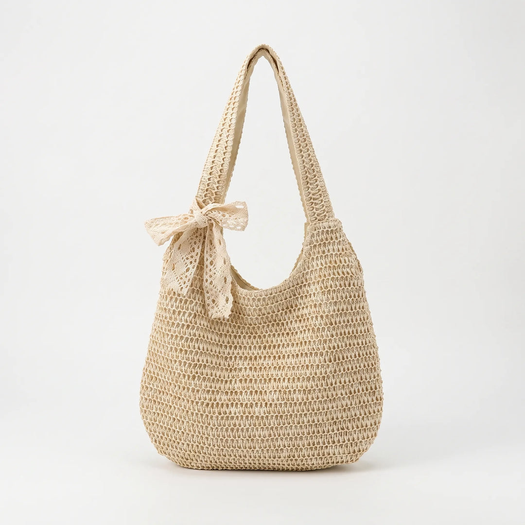 Soft knit crochet oversized beach tote bag, a comfortable women's shoulder bag for summer trips.