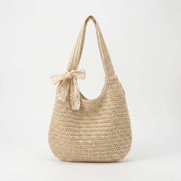 Soft knit crochet oversized beach tote bag, a comfortable women's shoulder bag for summer trips.