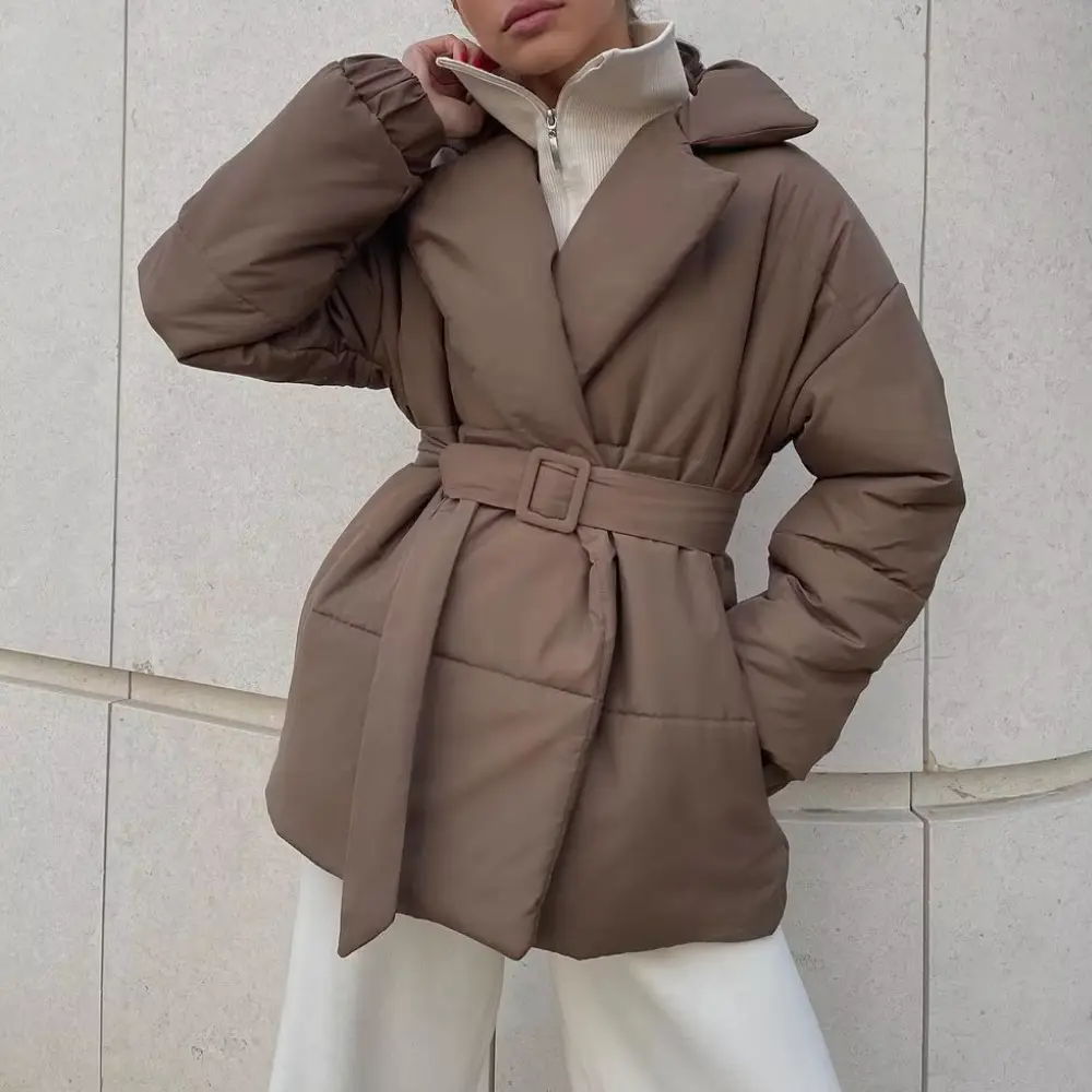 Women's belted puffer winter jacket with stylish lapel, perfect for cold weather fashion & cozy outerwear.