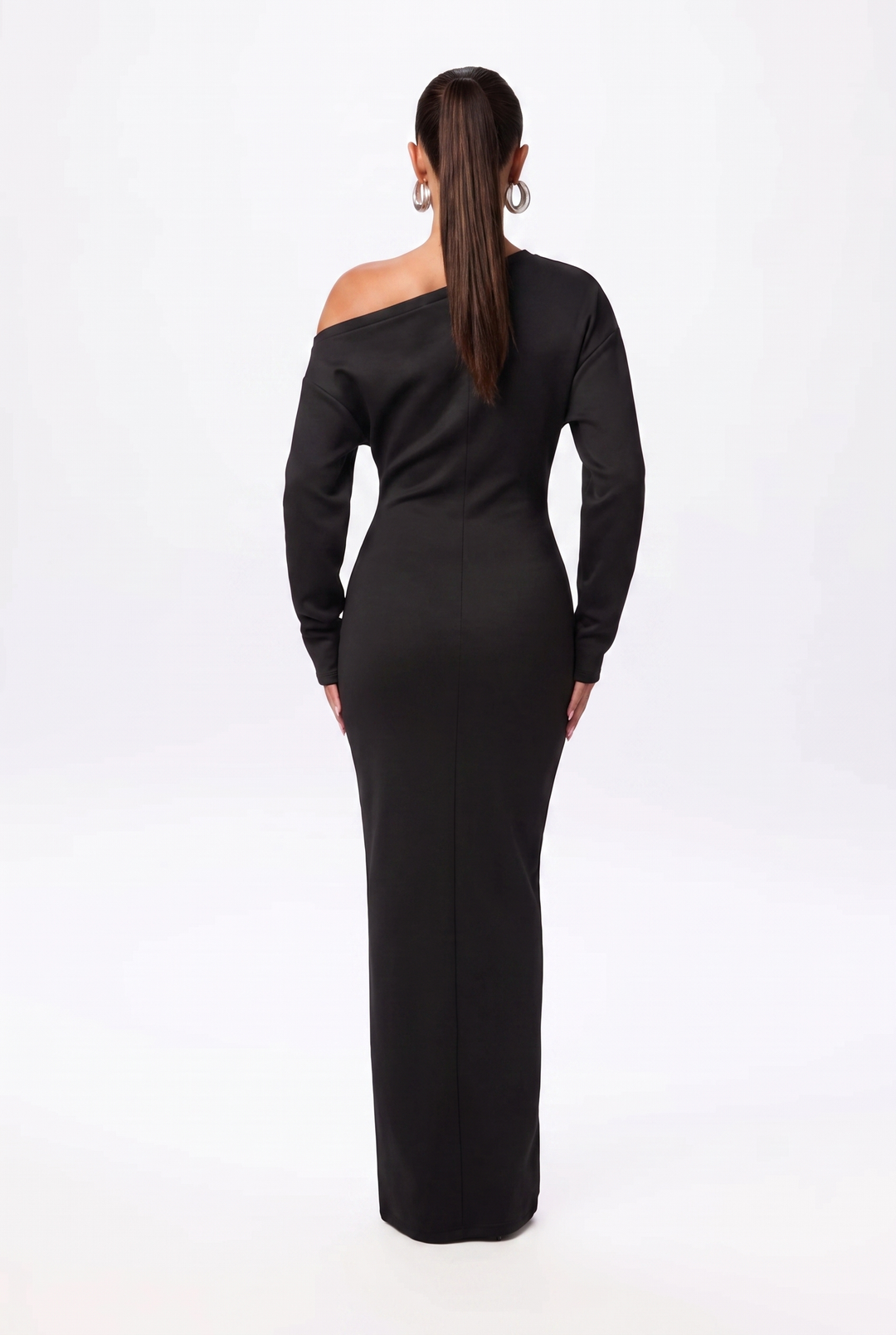 Stylish black off-shoulder women's maxi dress. Comfortable & flattering long sleeve design for chic evening or casual outfits.