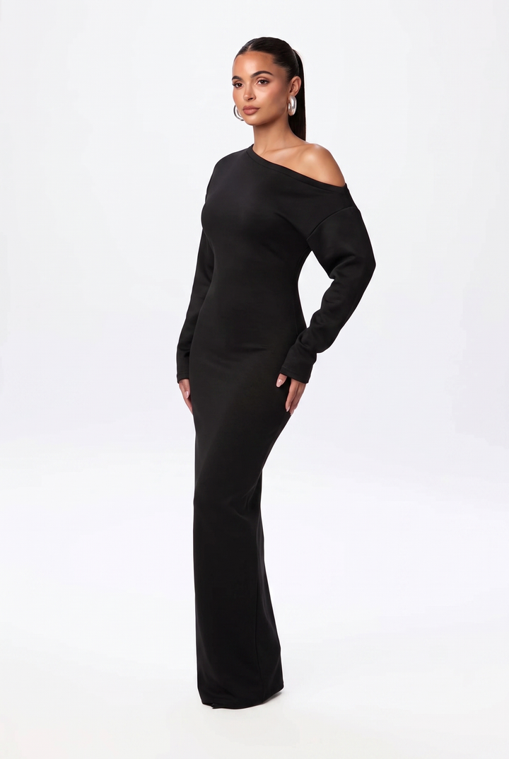 Chic women's off-shoulder black maxi dress. Long sleeve design, versatile for elegant evenings or stylish casual wear.
