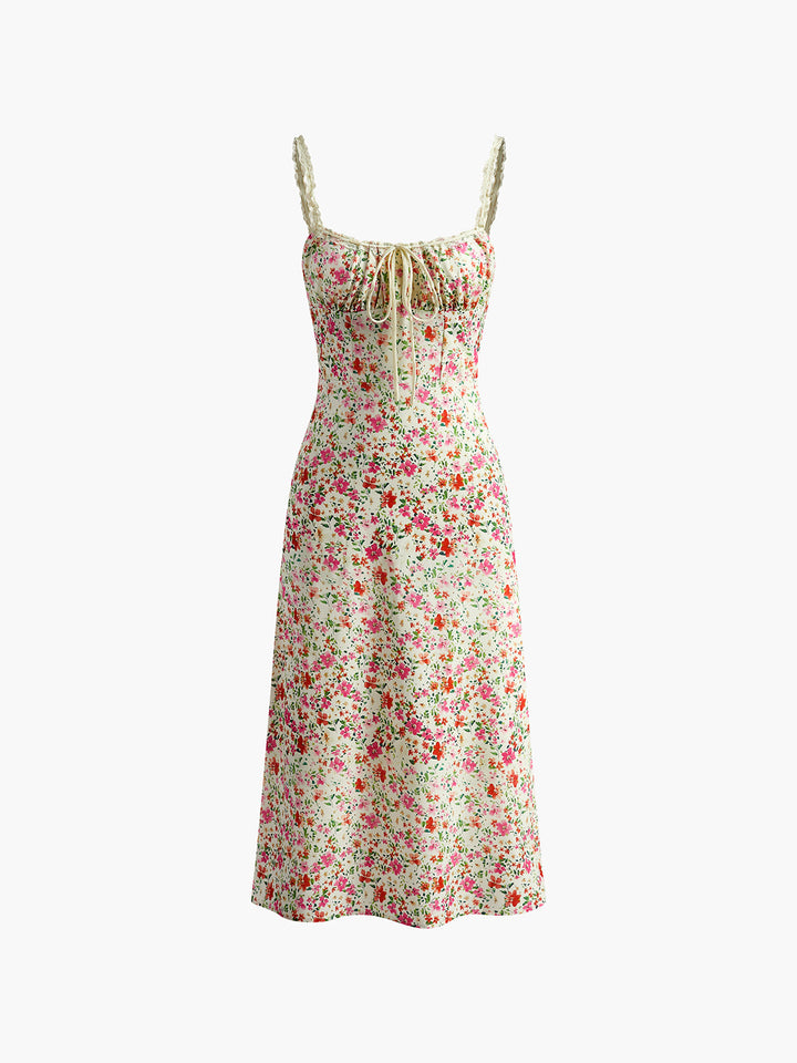 Chic floral cami midi dress for women. Sleeveless tie-front sundress, perfect for elegant summer fashion.