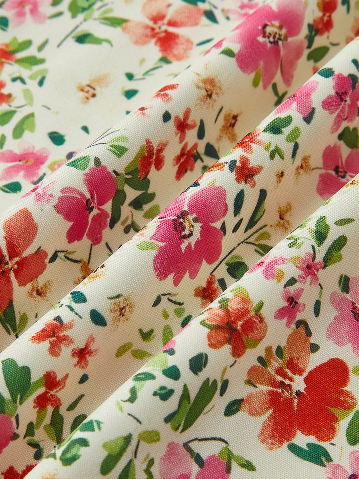 Flowy floral women's midi sundress, a flattering tie-front cami dress for comfortable and elegant summer fashion.