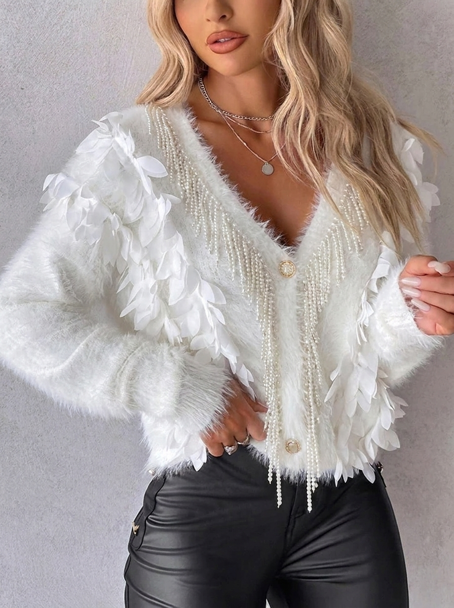 Women's elegant oversized cardigan with distinctive petal sleeves & V-neck. Chic & versatile button-front knitwear.