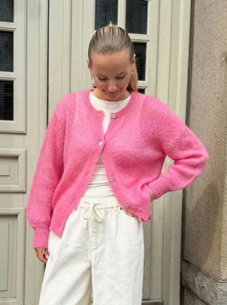 Women's fluffy oversized knit cardigan with button front. Cozy, relaxed fit for stylish spring & fall layering.