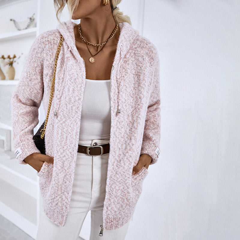 Cozy women's full-zip hooded sweater, an essential for relaxed everyday fashion.
