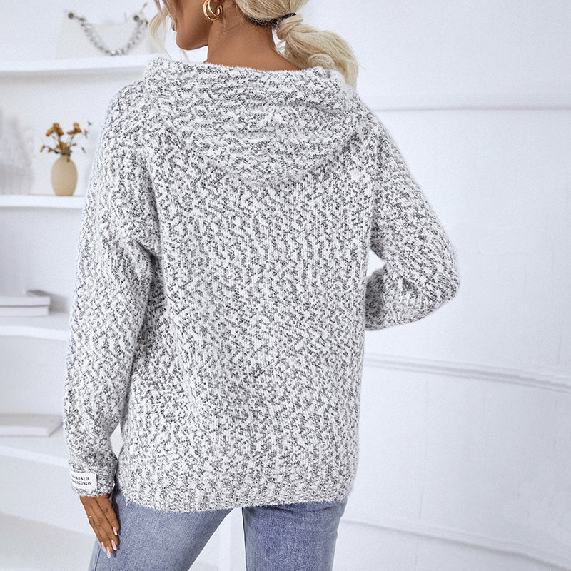 Soft knit women's hooded zip-up sweater, ideal for versatile everyday fashion and warmth.