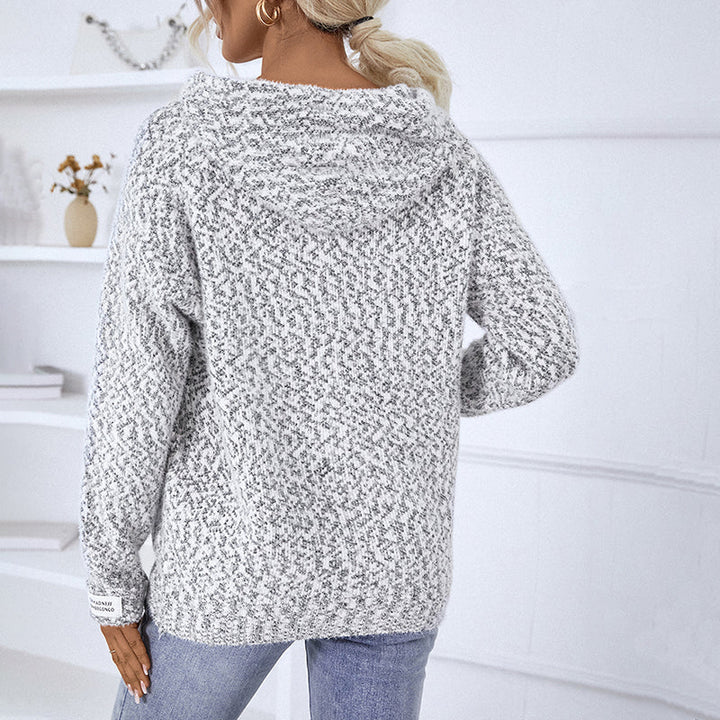 Soft knit women's hooded zip-up sweater, ideal for versatile everyday fashion and warmth.