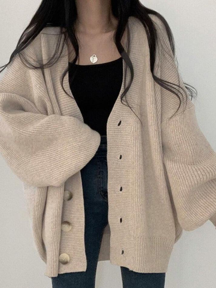 Comfortable women's oversized cardigan with button front, ideal for casual wear and effortless, relaxed style.