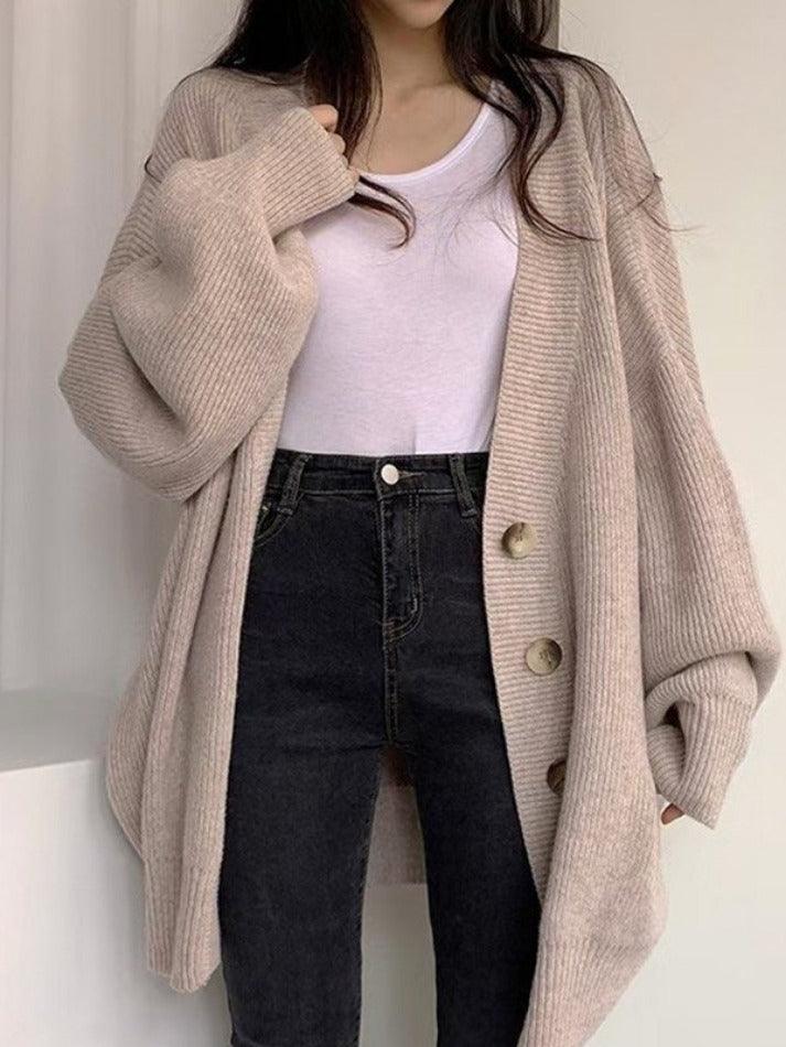 Versatile women's oversized button-front cardigan for layering, offering chic style for everyday fashion.