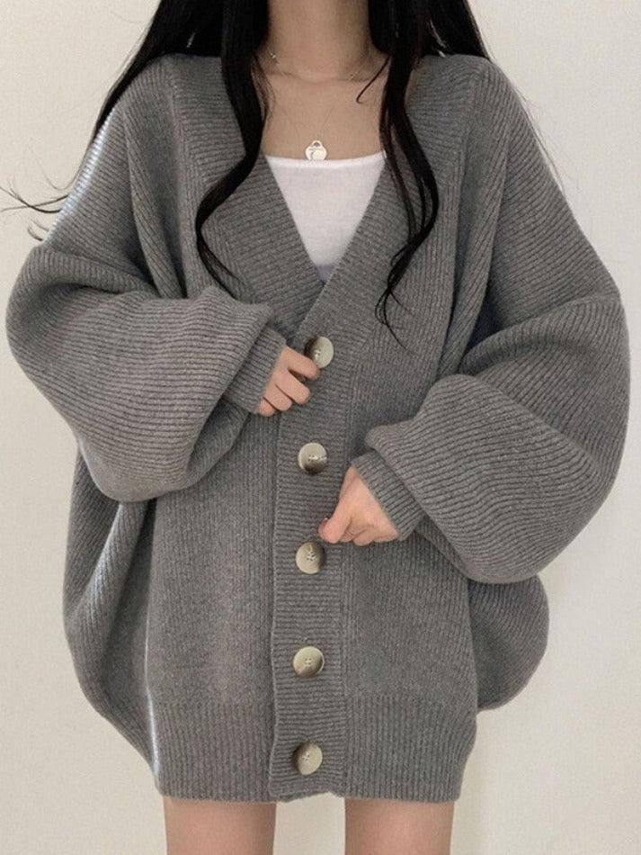 Effortless everyday fashion: women's oversized button-front cardigan, offering a comfortable & chic relaxed fit.
