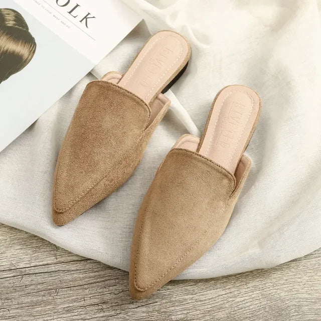 Effortless women's pointed toe slip-on mules with a comfortable block heel, perfect for versatile daily fashion.