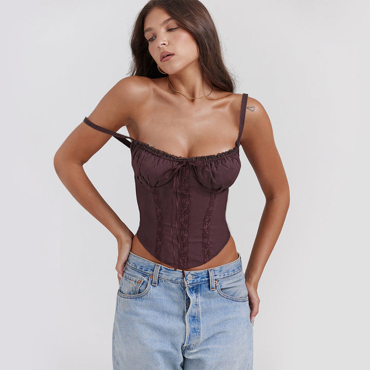 Versatile cropped corset top for women, with a chic ruffle bust and tie-front detail.