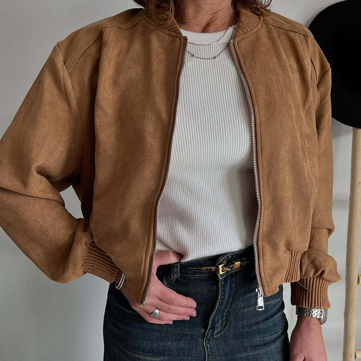 Women's stylish cropped bomber jacket with zip-up front & ribbed trim, perfect for casual fashion.
