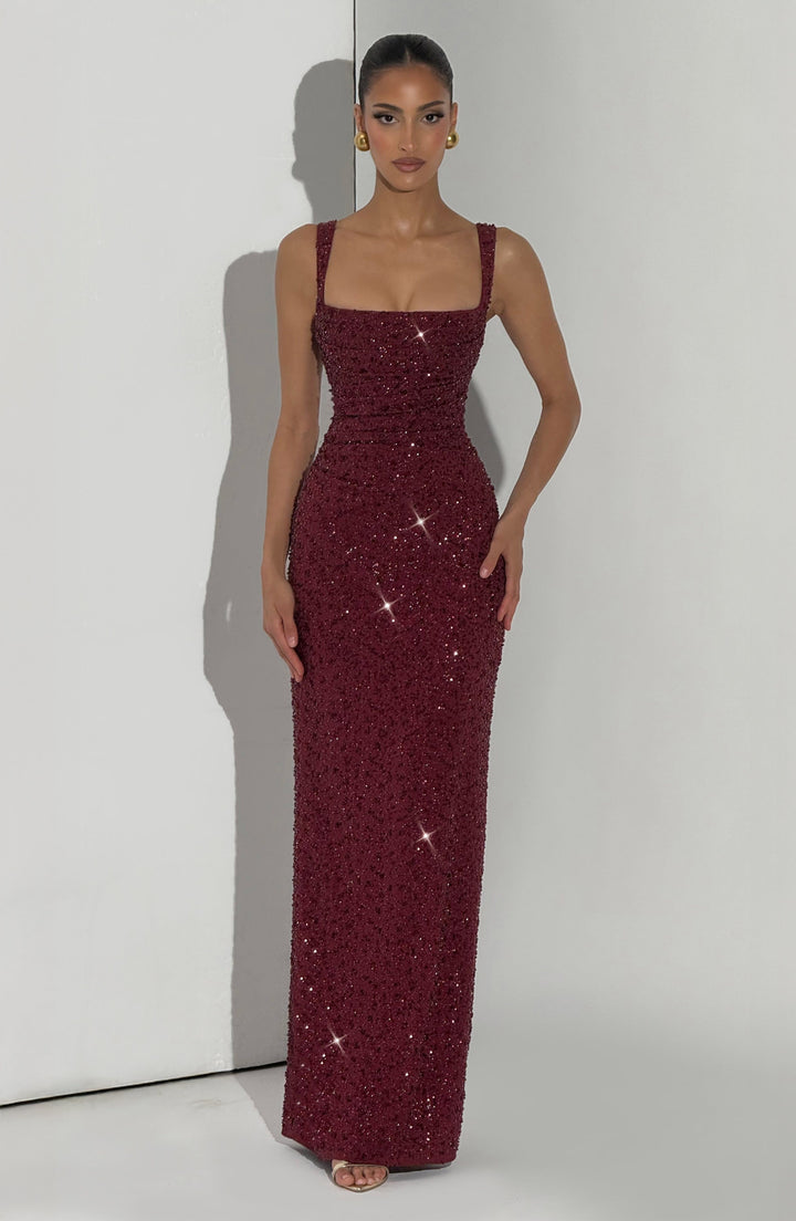 Glamorous sequin party dress, a long formal women's gown with a square neckline, suitable for special events.