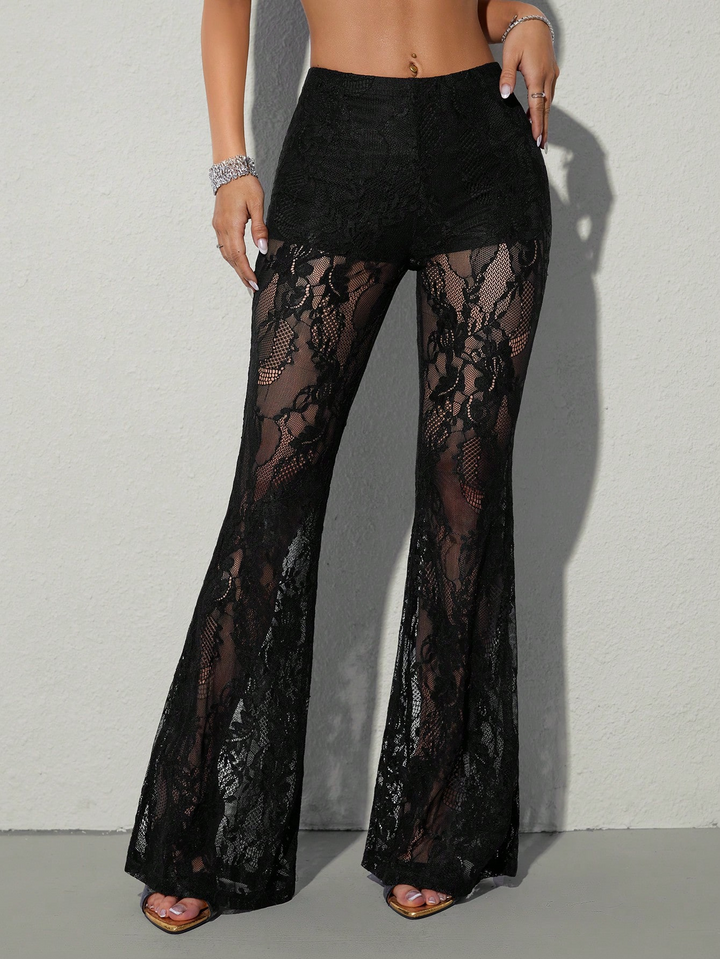 Fashionable women's flare pants featuring high waist & elegant sheer panels for a chic, flattering look.