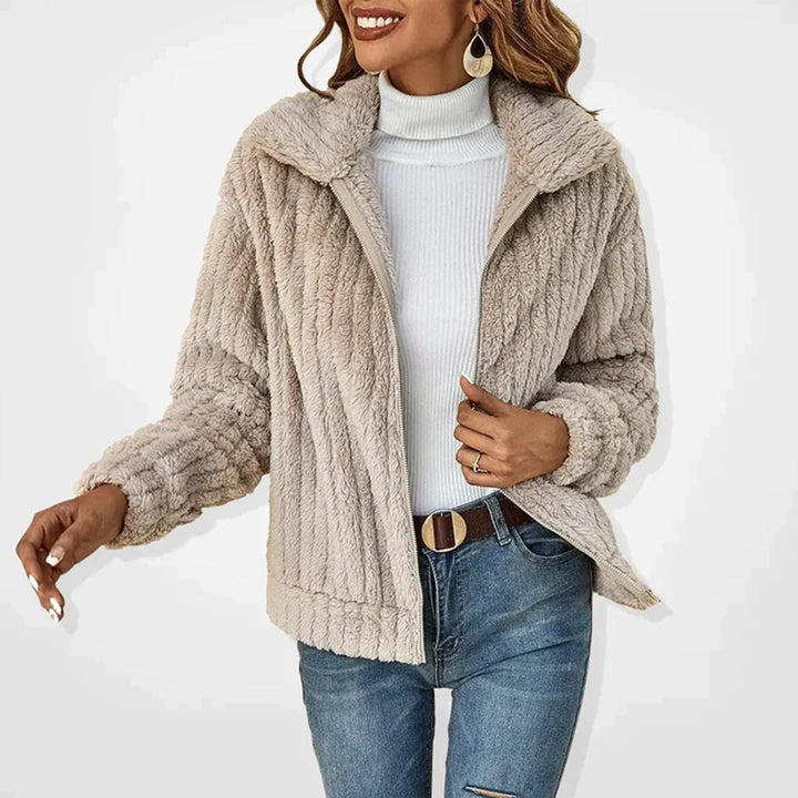 Chic Ember women's fleece vest for cozy layering. Perfect warm outerwear for fall and winter casual style.