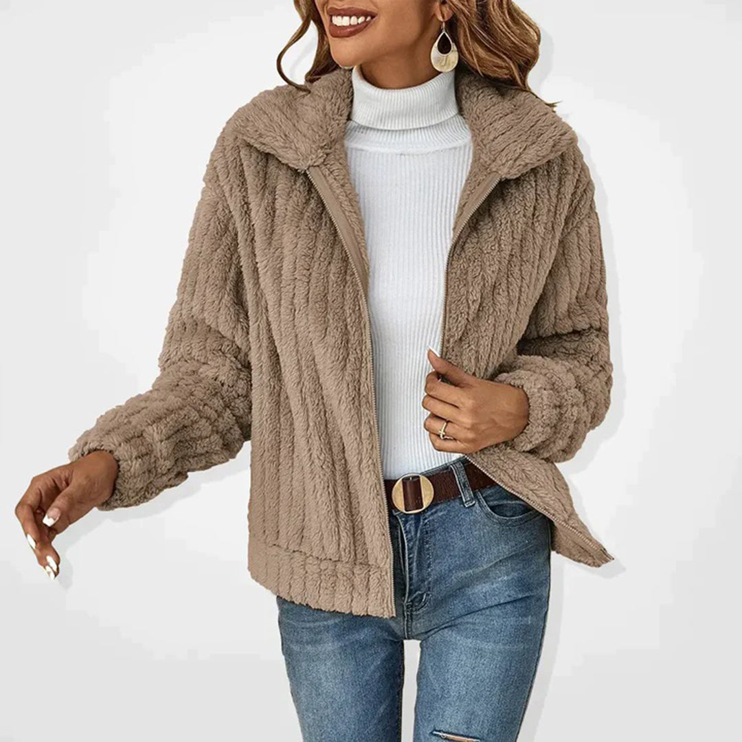 Cozy Ember women's fleece vest, a stylish layering piece for winter fashion and comfortable outerwear.