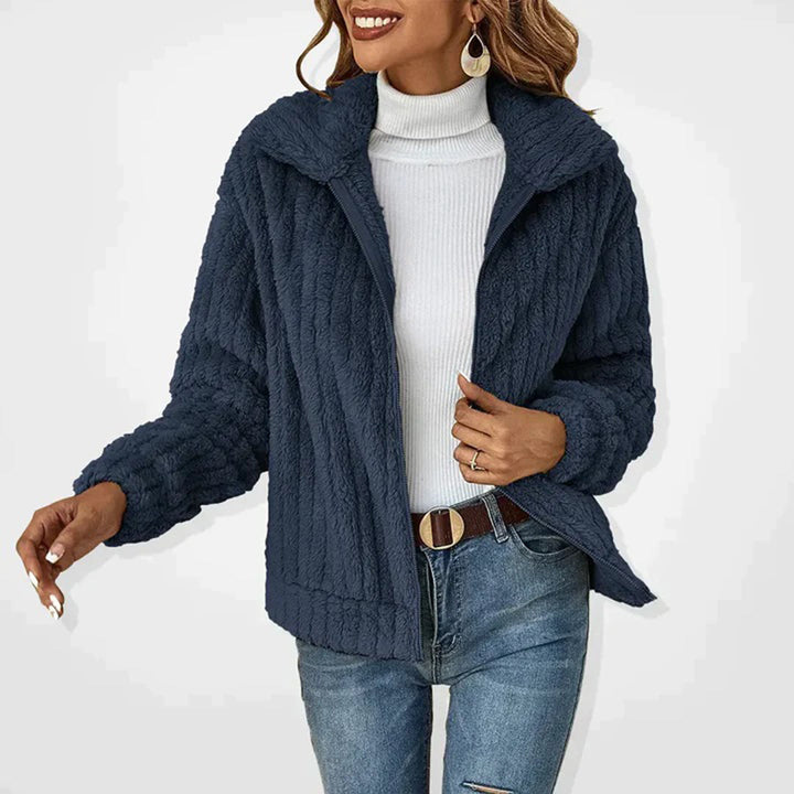 Ember fleece vest for women, a comfortable and chic layering essential for fall and winter casual outfits.