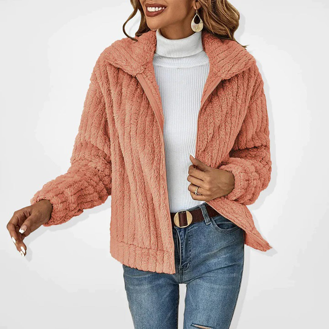Soft Ember women's fleece vest, providing cozy warmth and chic style for your fall and winter wardrobe.