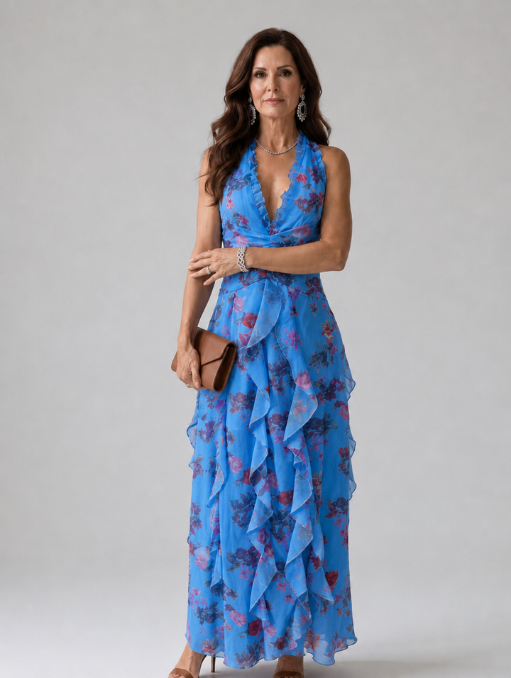 Stunning women's summer floral dress with a halter neck & elegant ruffles, a must-have maxi for any party.