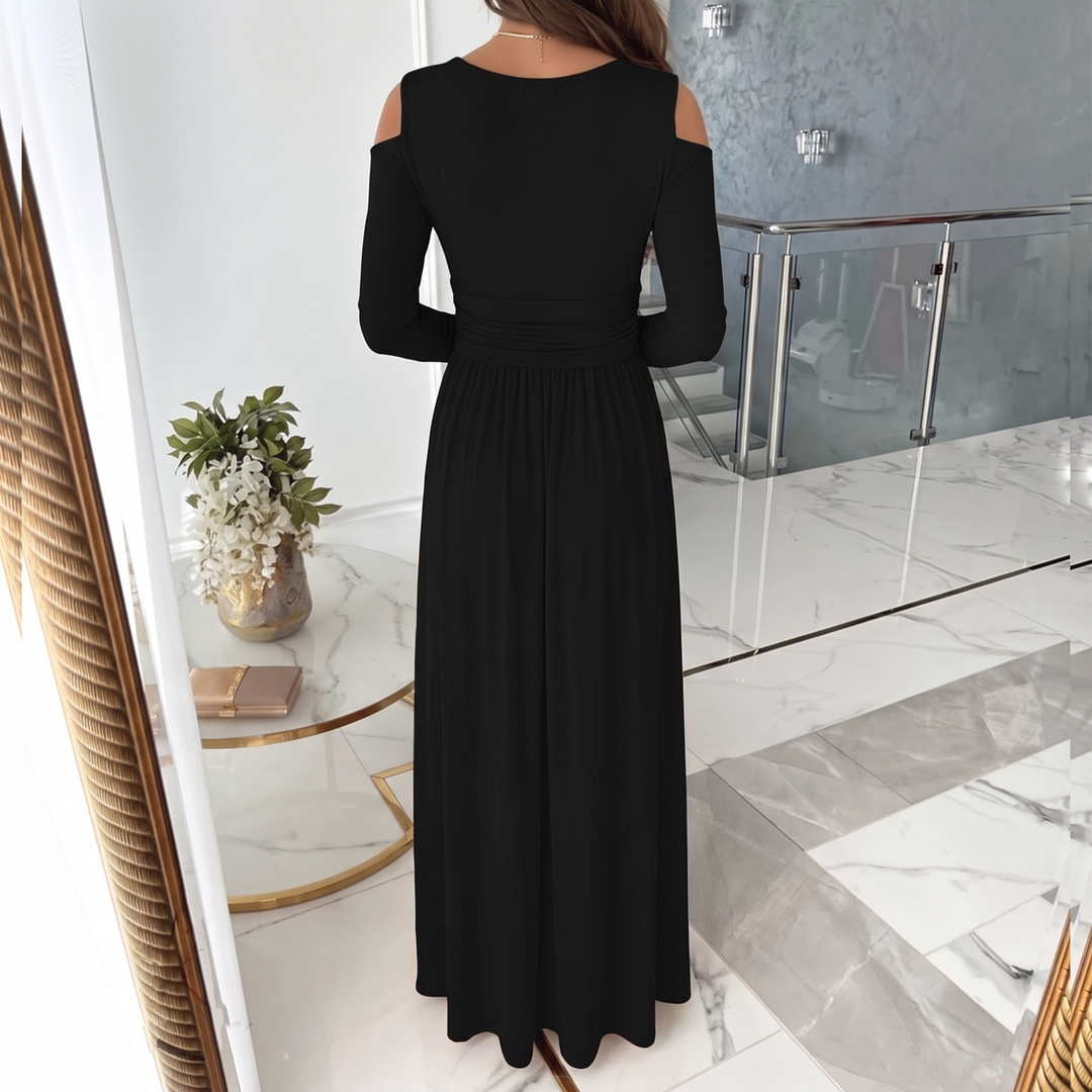 Flowy women's cold shoulder V-neck maxi formal dress with high slit. Ideal for evening events & wedding guests.