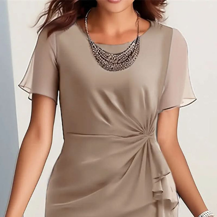 Round neck elegant midi dress for women, featuring chic flutter sleeves and a graceful ruffle hem design.