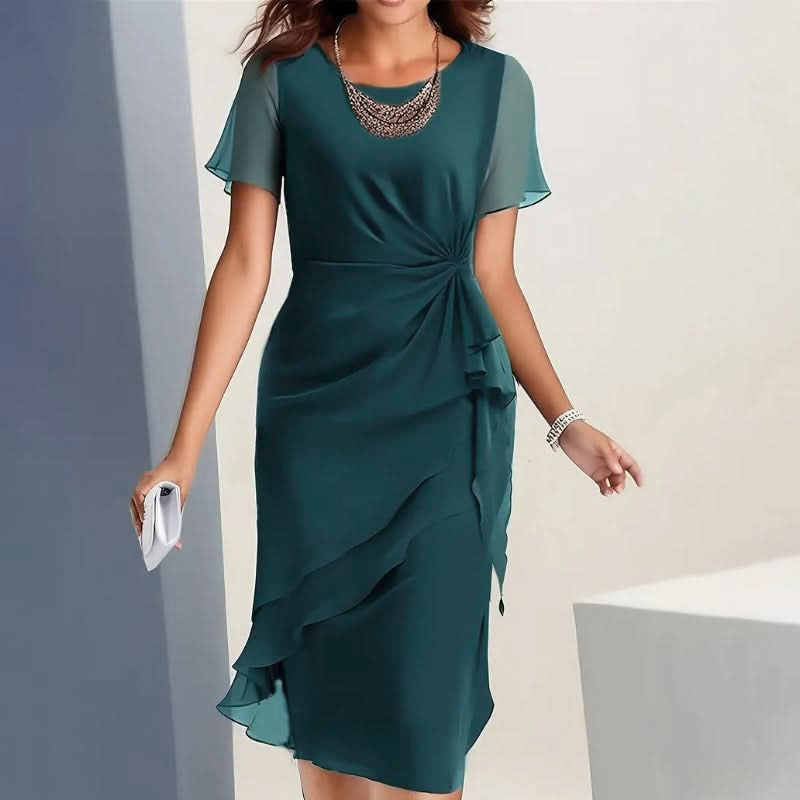 Daytime elegant women's midi dress with short flutter sleeves & ruffle hem. Perfect for sophisticated casual.