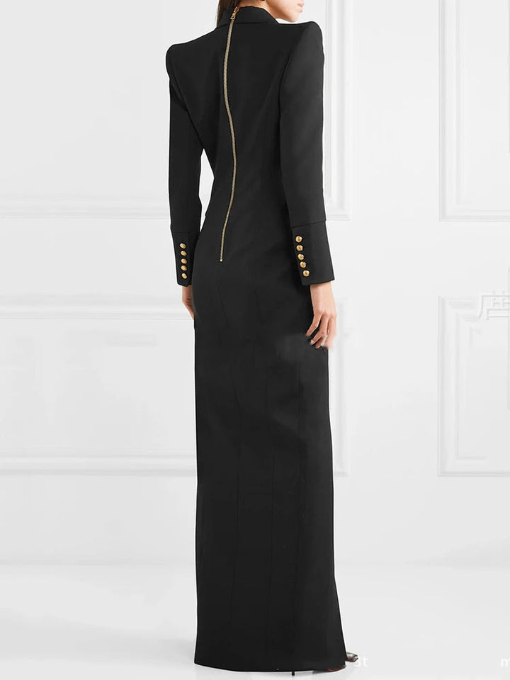 Close-up of a women's tailored blazer dress featuring a sharp lapel, long sleeves, and a sophisticated front split.