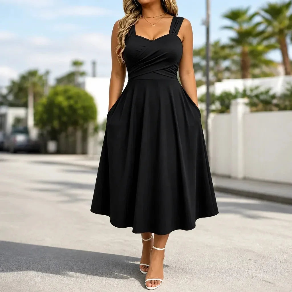 Women's midi cocktail dress featuring a flattering fit and practical side pockets.