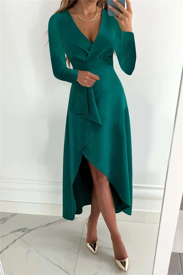 Women's formal elegant V-neck wrap long sleeve dress. Ideal for evening, cocktail, or party wear. Asymmetric hem.