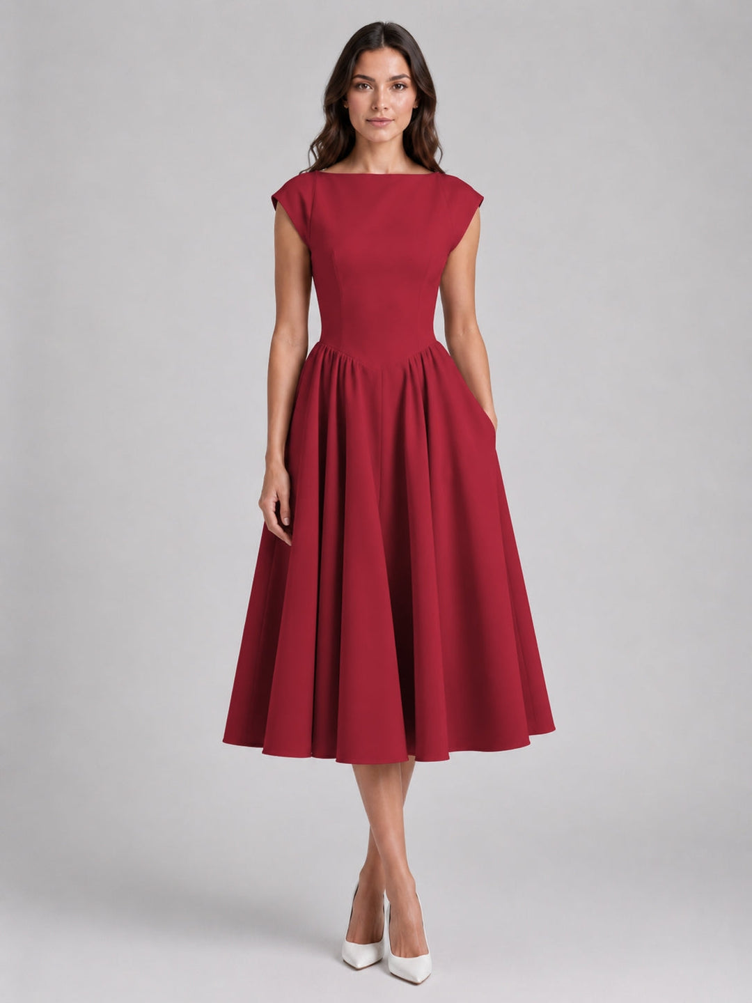 Stylish women's midi graduation dress, elegant boat neck, and striking open back for your special day.