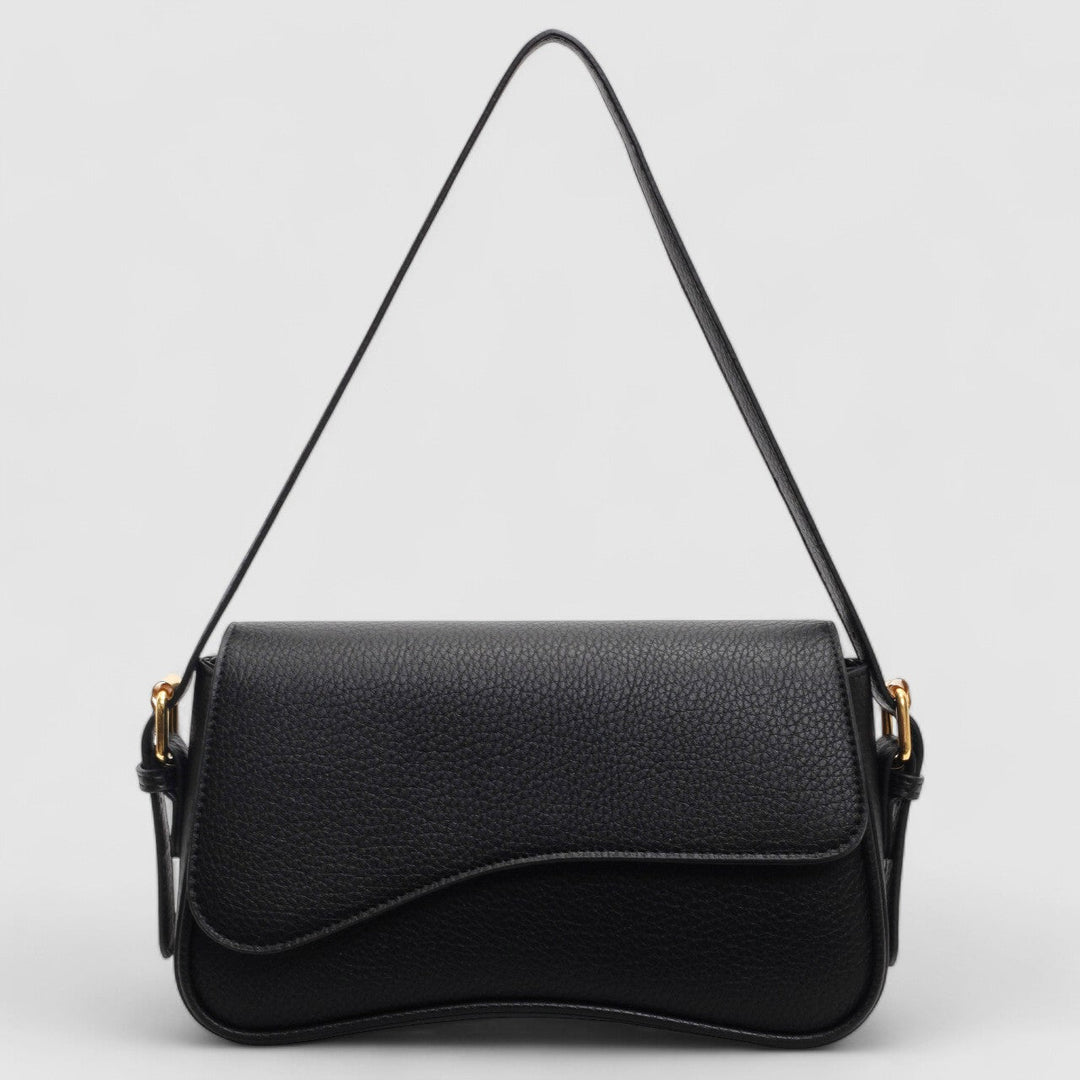 Fashionable wave flap shoulder bag for women. Structured and elegant, ideal for daily essentials and chic style.