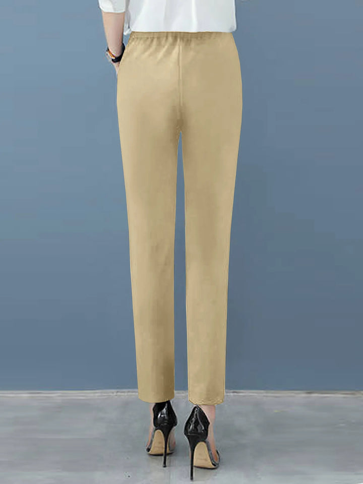 Modern women's pleated work pants with a comfortable high waist and a contemporary tapered silhouette.