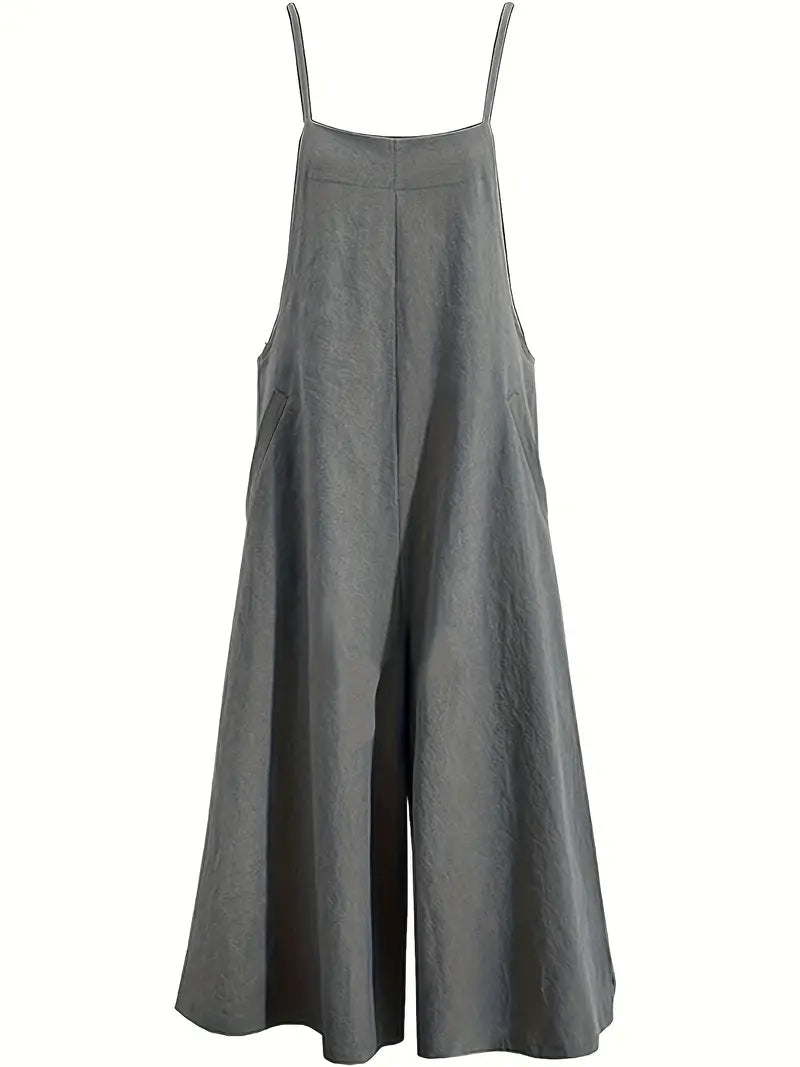 Effortless wide leg jumpsuit for women. Features adjustable straps & pockets, perfect for versatile summer fashion.